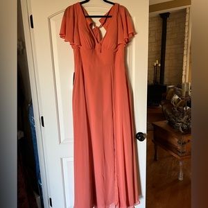 This is a Women’s Azazie Coral bridesmaid dress.